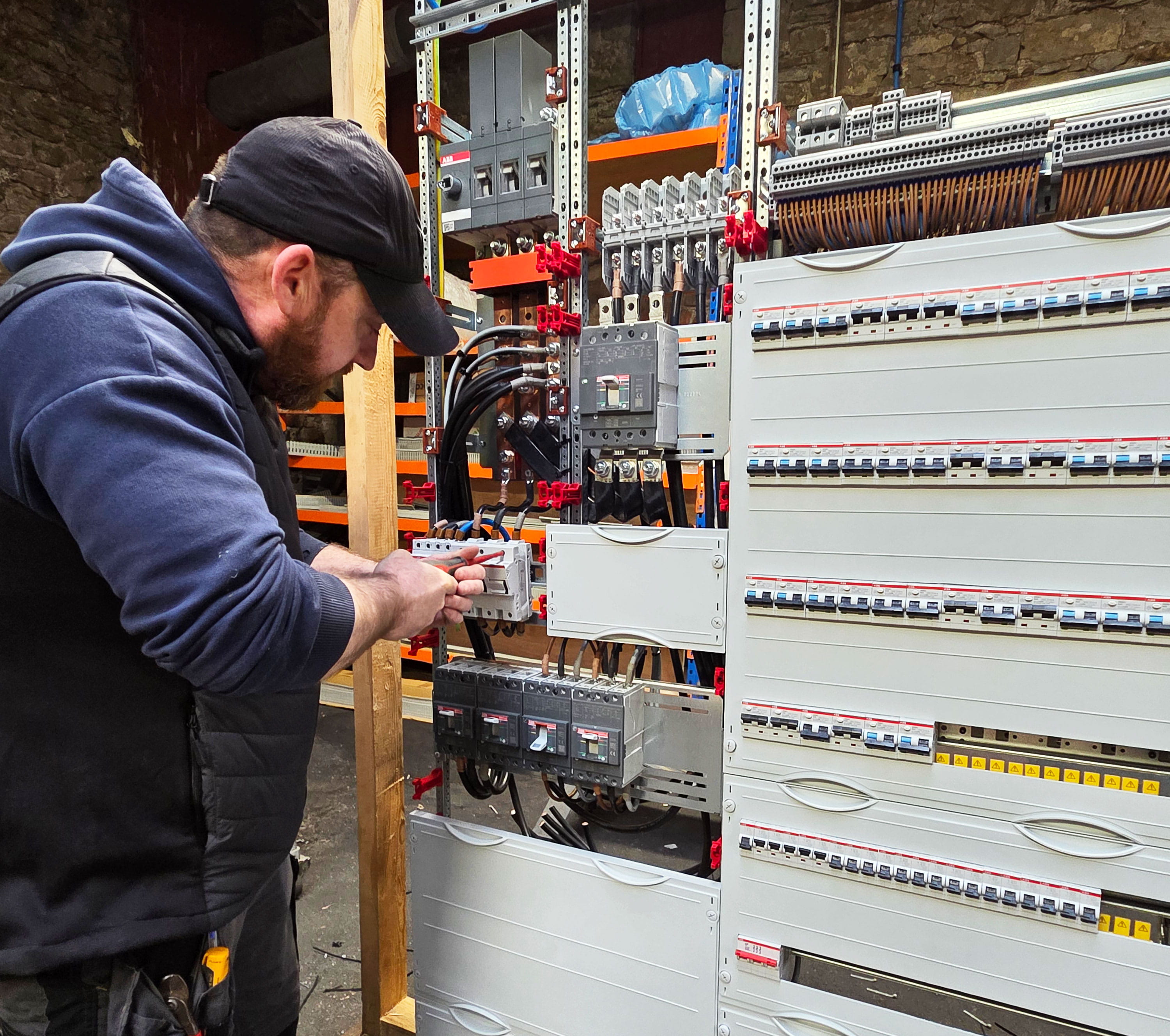 ECS NI engineer building a distribution board in the Aughnacloy workshop