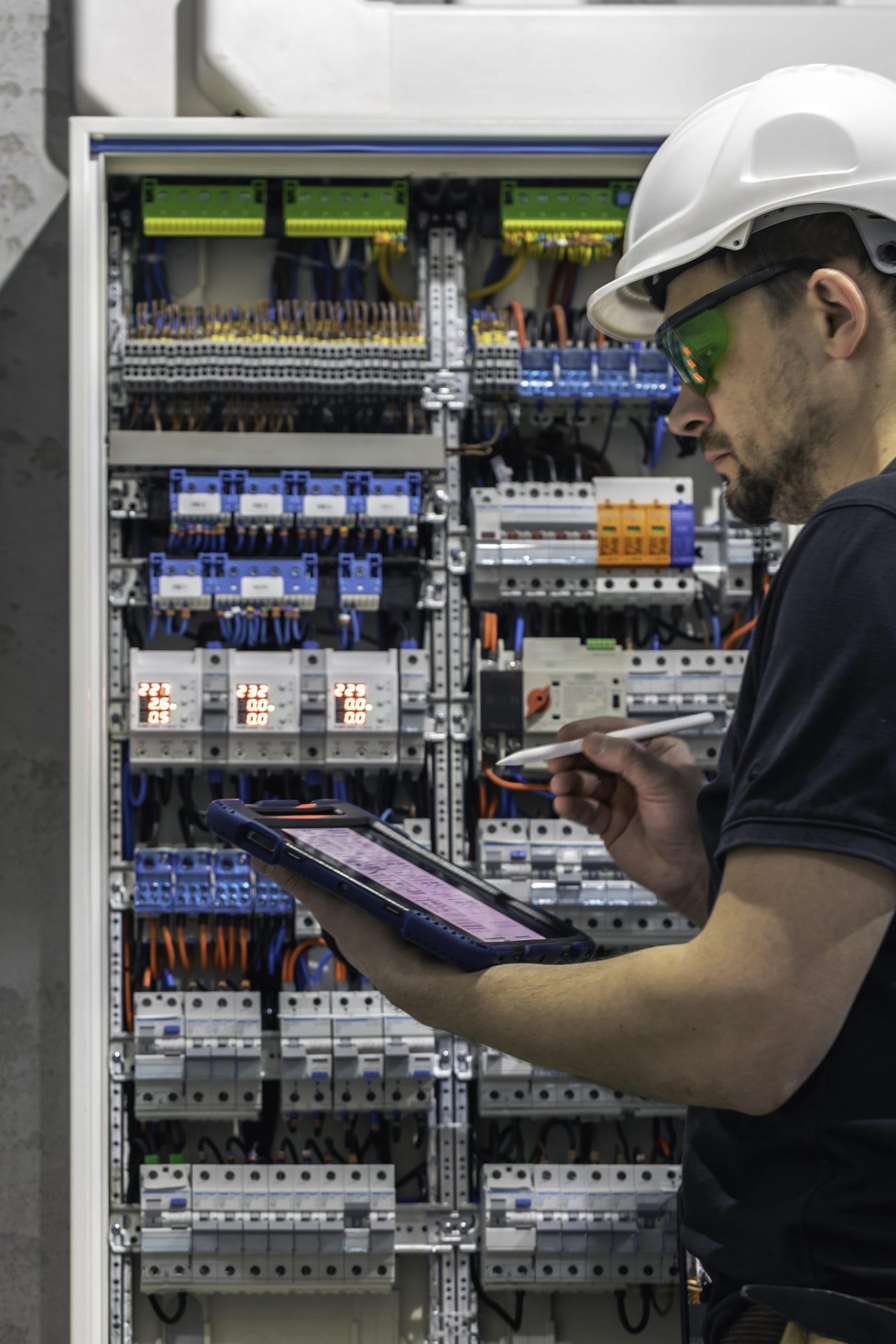 Electrical engineer commissioning a switchboard